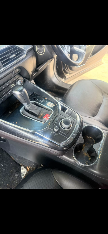 Centre console full of crumbs and dust
