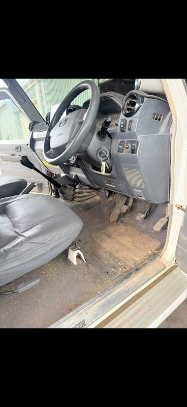 LandCruiser cabin floor caked in dirt